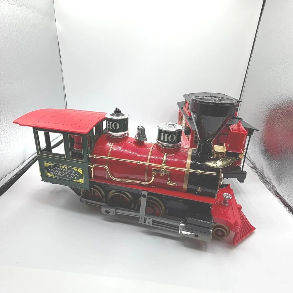 Lionel Holiday Special BLT-00 LIONEL Train ENGINE AND CABOOSE ONLY AS IS